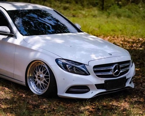 White gentleman Mercedes-Benz W205 coupe slammedenuff cool figure