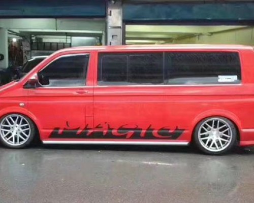 Fire red Volkswagen Multivan slammedenuff MPV low lying wind