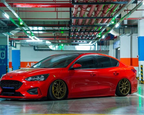 Static display of the new Ford Focus slammedenuff perfectly affixed to the ground
