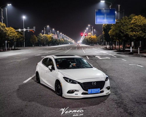 “Redefined Elegance: The Mazda 3 Axela Slammedenuff Customization”